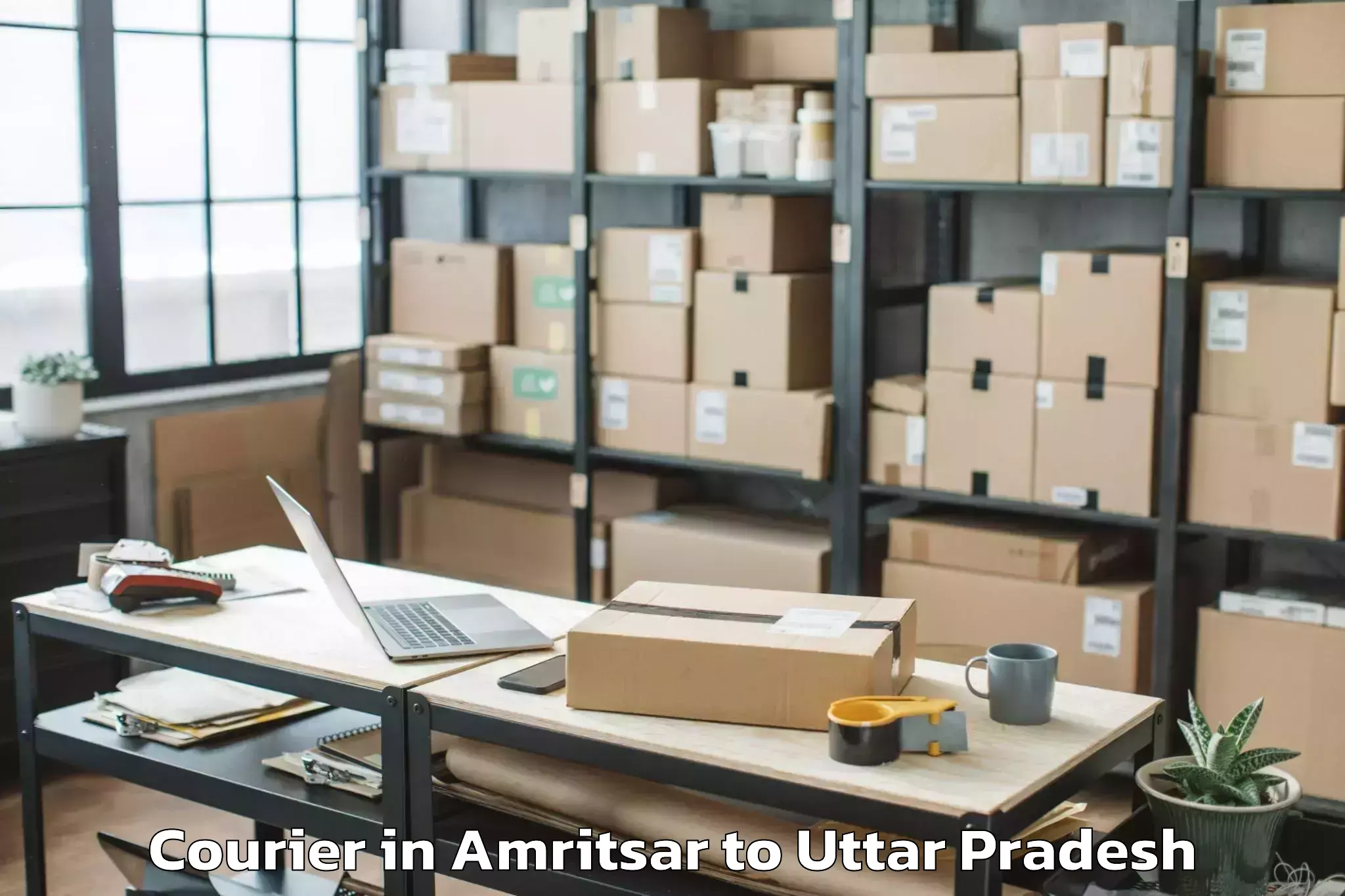 Leading Amritsar to Gahmar Courier Provider